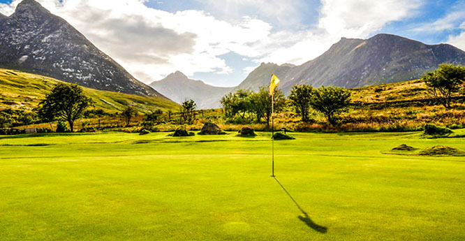 Corrie Golf Club green framed by the mountains of Arran